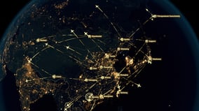 A night-view map of Asia showing glowing flight routes connecting major cities such as Shanghai, Yokohama, and Bishkek, visualizing dense regional air traffic.