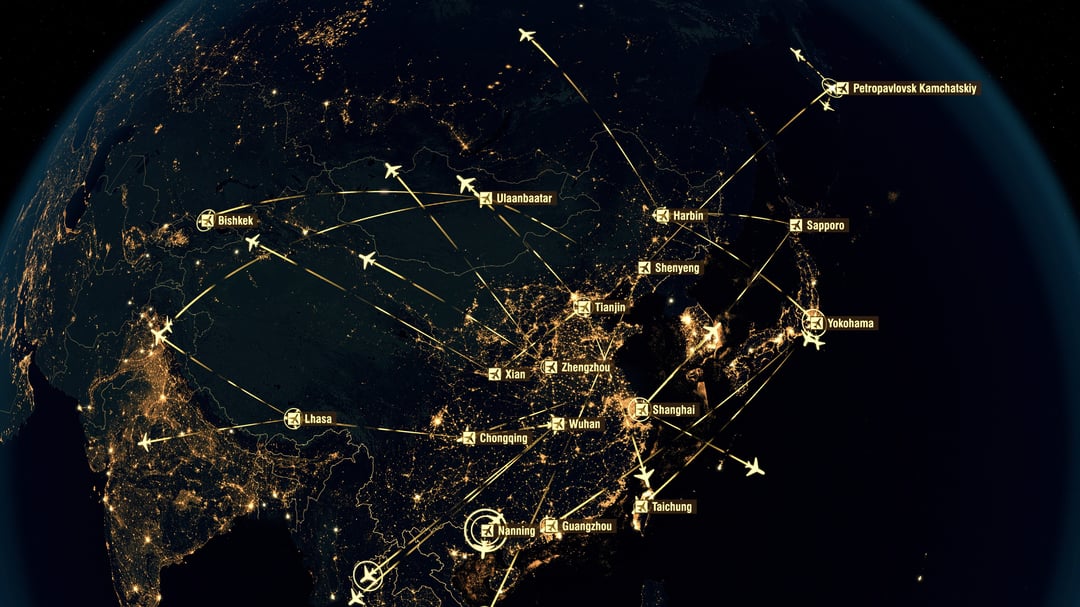 A night-view map of Asia showing glowing flight routes connecting major cities such as Shanghai, Yokohama, and Bishkek, visualizing dense regional air traffic.